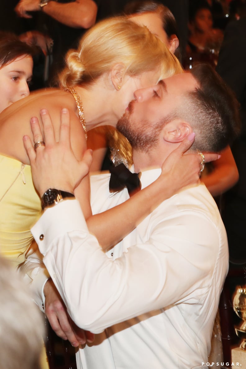 Reese Witherspoon gave Aaron Taylor-Johnson a celebratory smooch.