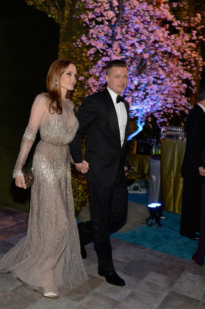 Angelina Jolie and Brad Pitt walked into the party.