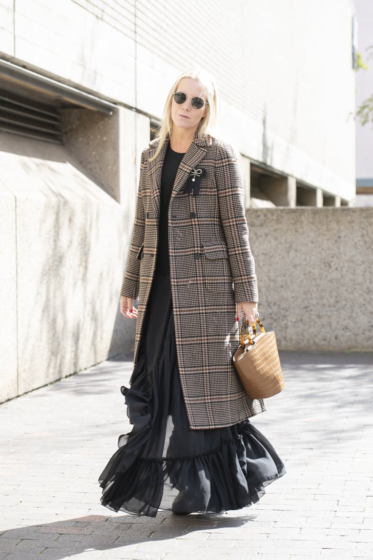 Team a Flounced Dress With a Classic Coat | How to Wear a Maxi Dress in ...