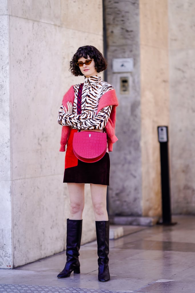 Liven up a simple miniskirt with an animal print top and a neon bag.
