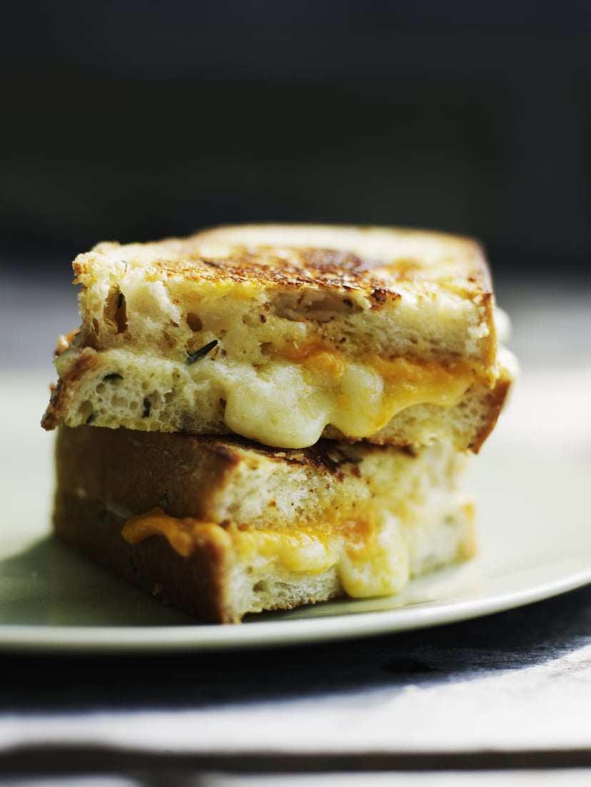 Grilled cheese sandwich with aged cheddar on rosemary crusty bread