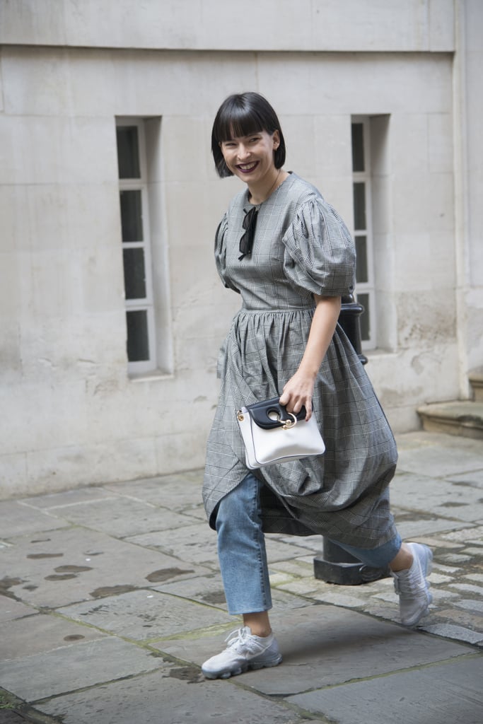 A dress over jeans? Yes. Add sneakers? Even better!
A dress over jeans? Yes. Add sneakers? Even better!