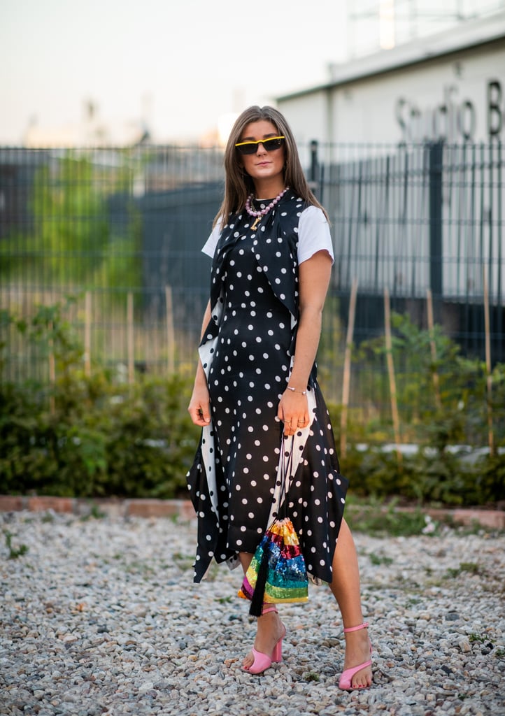 A white tee grounds a playfully printed dress and fun accessories.