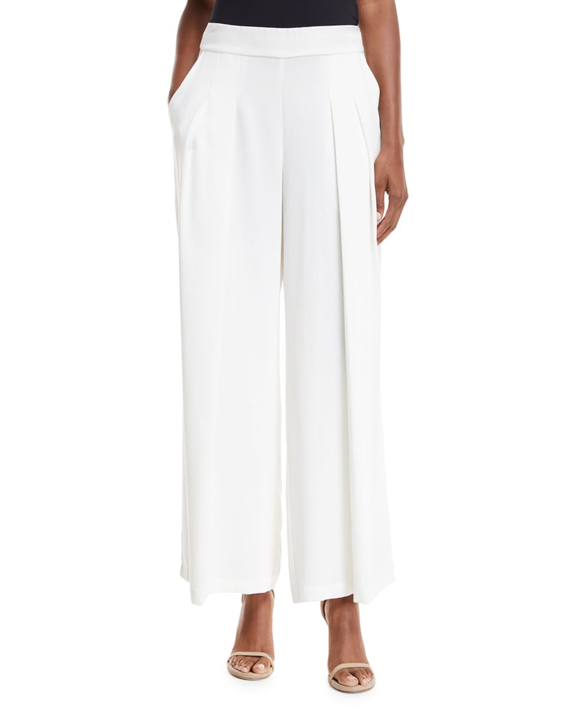 Jennifer Lopez Black Bodysuit and White Trousers | POPSUGAR Fashion