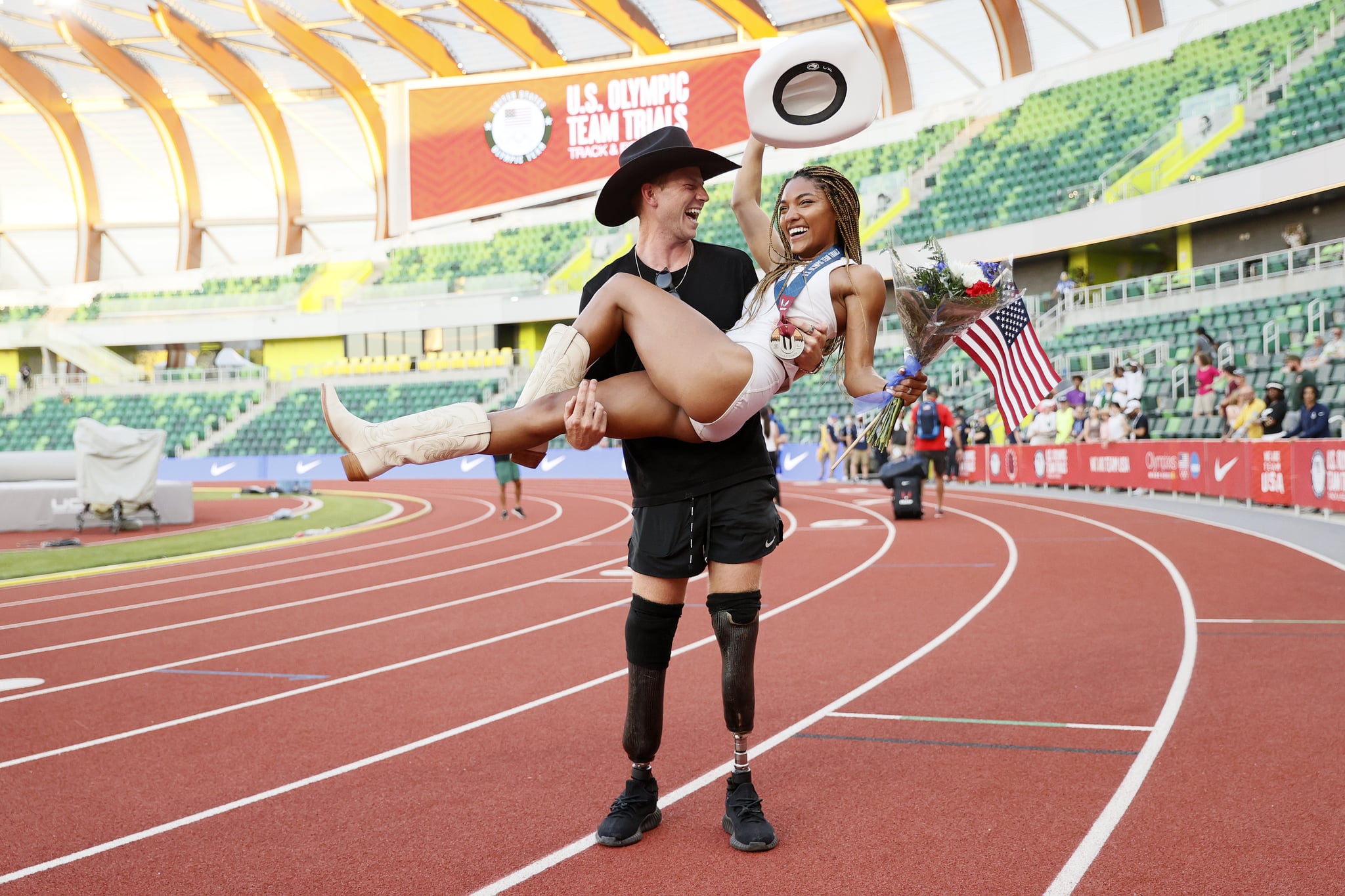 Tara Davis-Woodhall celebrates with Hunter Woodhall on day nine of the 2020 U.S. Olympic Track & Field Team Trials.