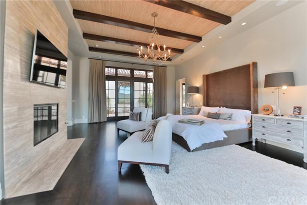 Wooden Beams Add Texture And Style To The Bedroom Ceiling
