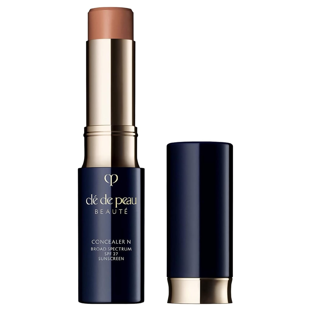 Clé de Peau Beauté Concealer SPF 27 ($75)
It doesn't get much easier than this multipurpose stick concealer. A little truly goes a long way, making it a solid long-term investment. Use it to brighten under-eyes, camouflage acne marks or scarring, or lightly even out your complexion when you want coverage without committing to full foundation.