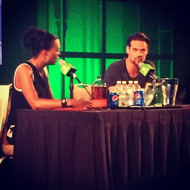 Aisha Tyler doing her podcast thing with Landon Car . . . er, Shane West.