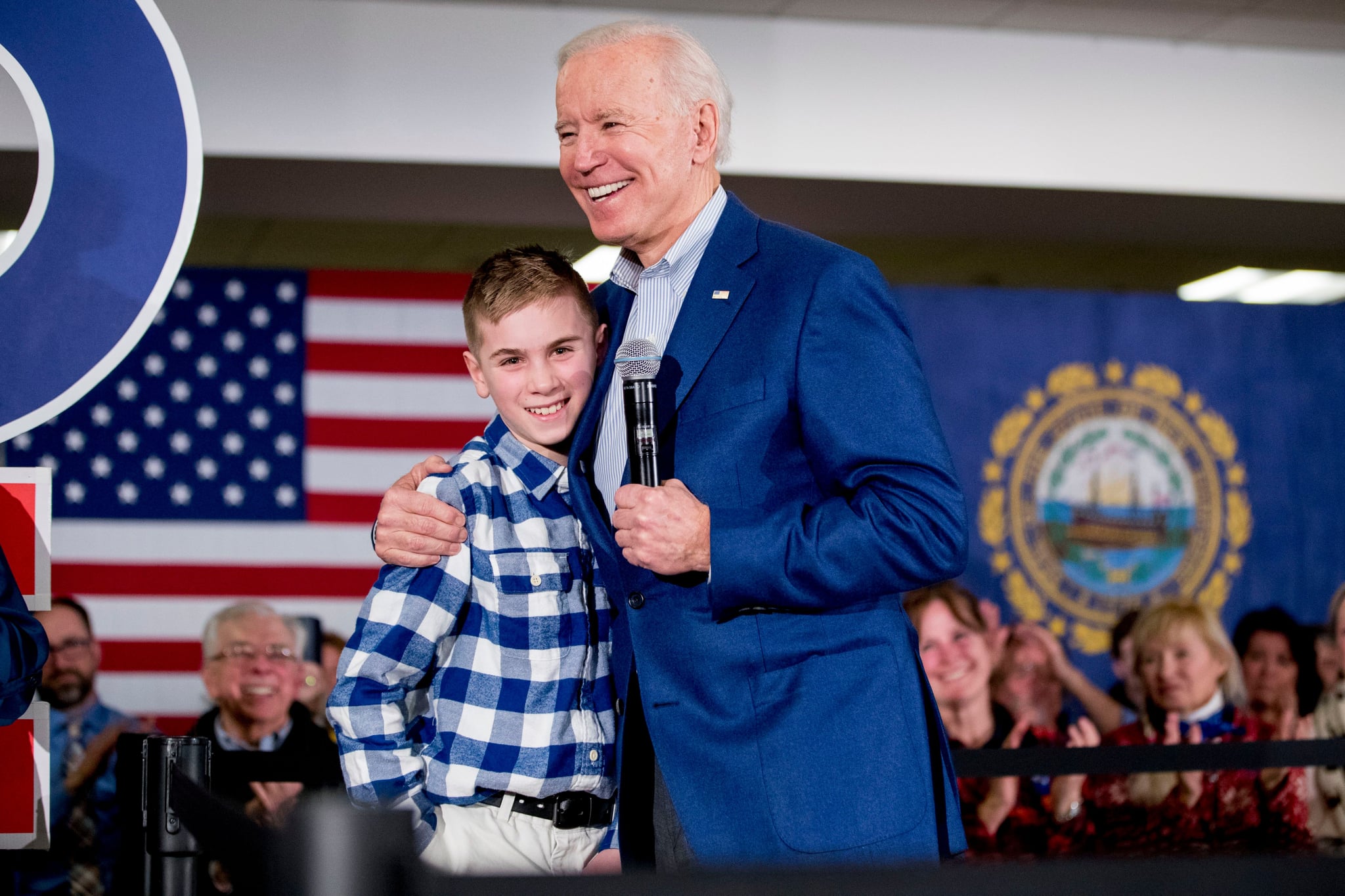 Mandatory Credit: Photo by Andrew Harnik/AP/Shutterstock (10553134a)Joe Biden, Brayden Harrington. Democratic presidential candidate former Vice President Joe Biden hugs Brayden Harrington, 12, at a campaign stop at Cilford Community Curch, in Gilford, N.H. Biden and Harrington have spoken to each other about their stutter they have both struggled withElection 2020 Joe Biden, Gilford, USA - 10 Feb 2020