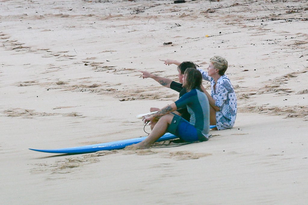 Charlize Theron and Sean Penn watched the sunset with a friend in Hawaii.
