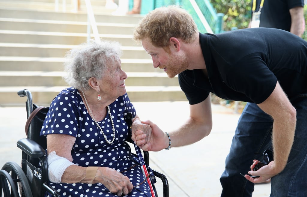 Prince Harry Kissing Elderly Woman's Hand at Invictus Games