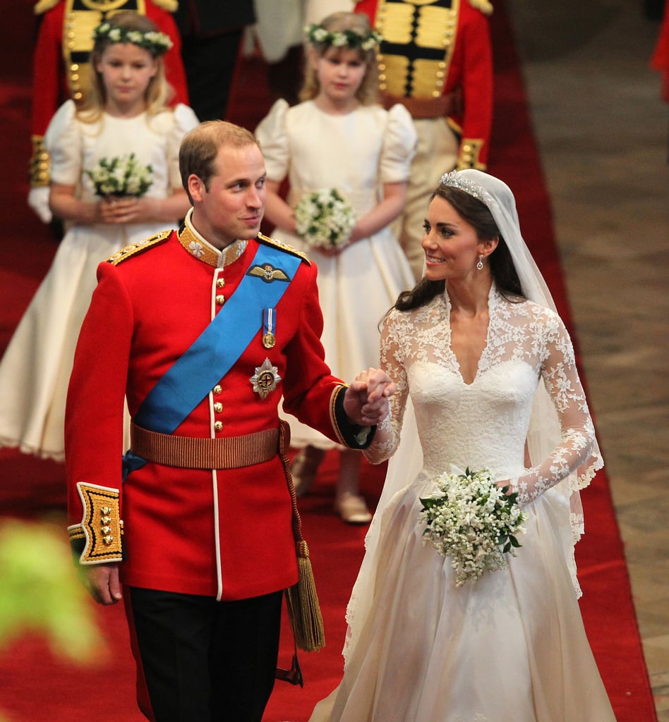 The Duke and Duchess of Cambridge are living a real-life fairy tale, and it's not just because they're part of the royal family. After meeting at the University of St. Andrews in Scotland, where they were living at the same residence hall, the two fell head over heels for each other. Even though they took a brief break from 2007 to 2010, they eventually got their happily ever after (or at least their happy beginning) when they tied the knot in one of the biggest and most newsworthy weddings of our generation in April 2011. 
Eight years and three children later, the pair still have that look of love whenever they're together. While they have had a number of sweet appearances over the course of their relationship, we can't help but notice the way Kate smiles at Will when he isn't looking. See the duchess's most royally in love moments ahead.