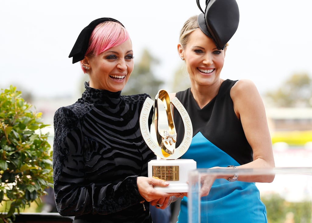 Nicole Richie and Clare Hawkes dressed to the nines for Golden Slipper Day at Royal Randwick Racecourse in Sydney, Australia, on Saturday.