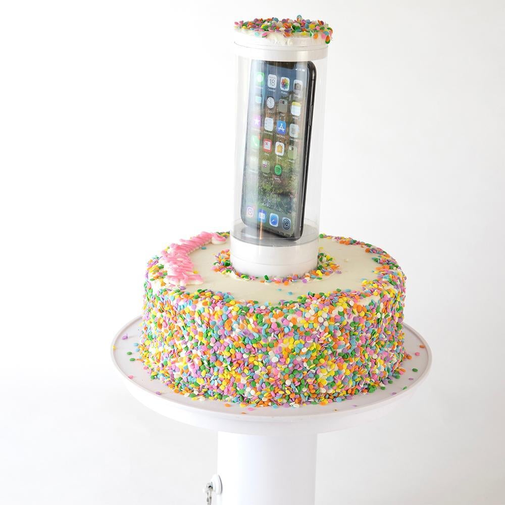 This Popping Cake Stand Lets You Hide a Gift Inside a Cake