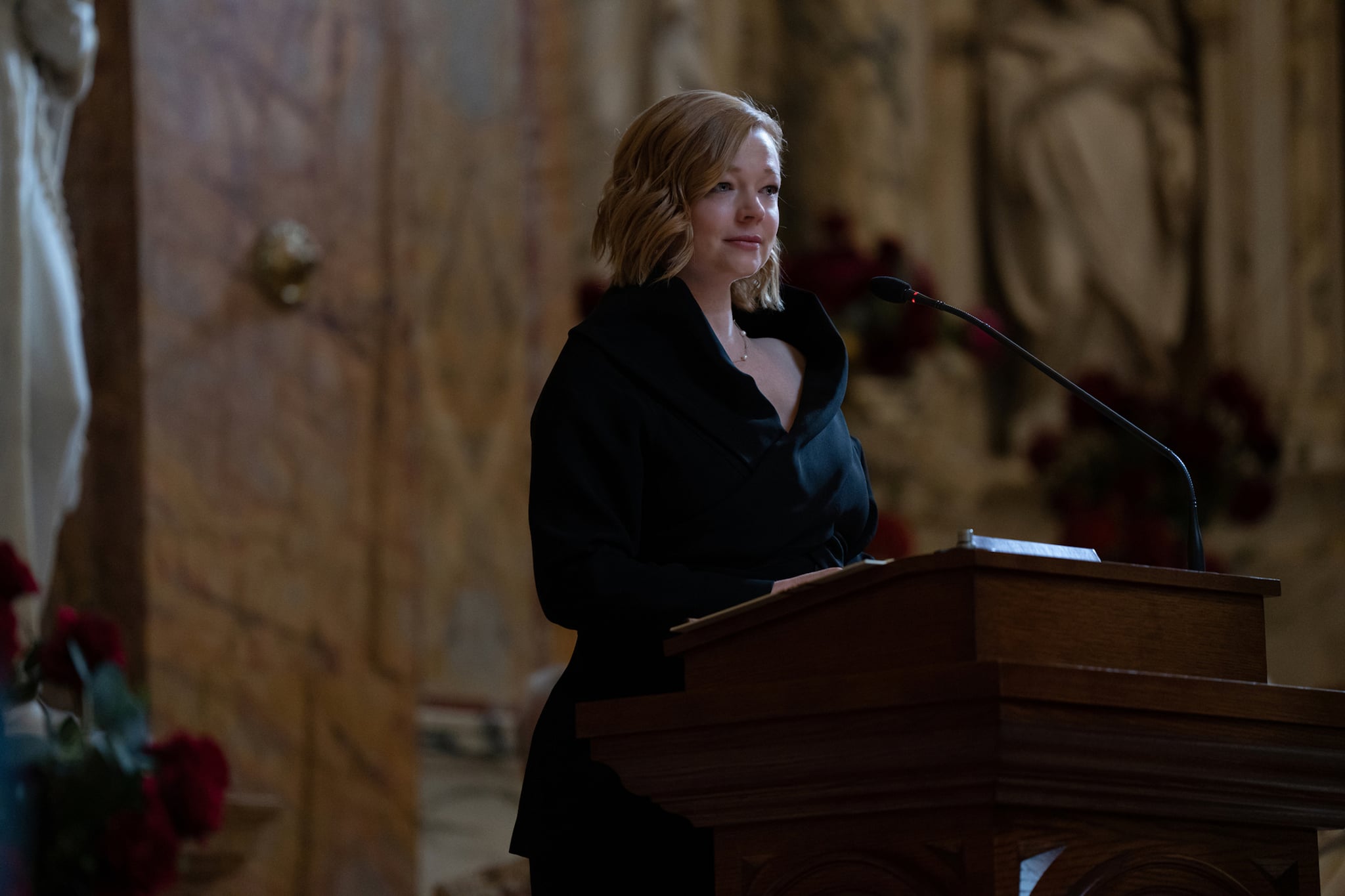 Sarah Snook as Shiv Roy at Logan's funeral