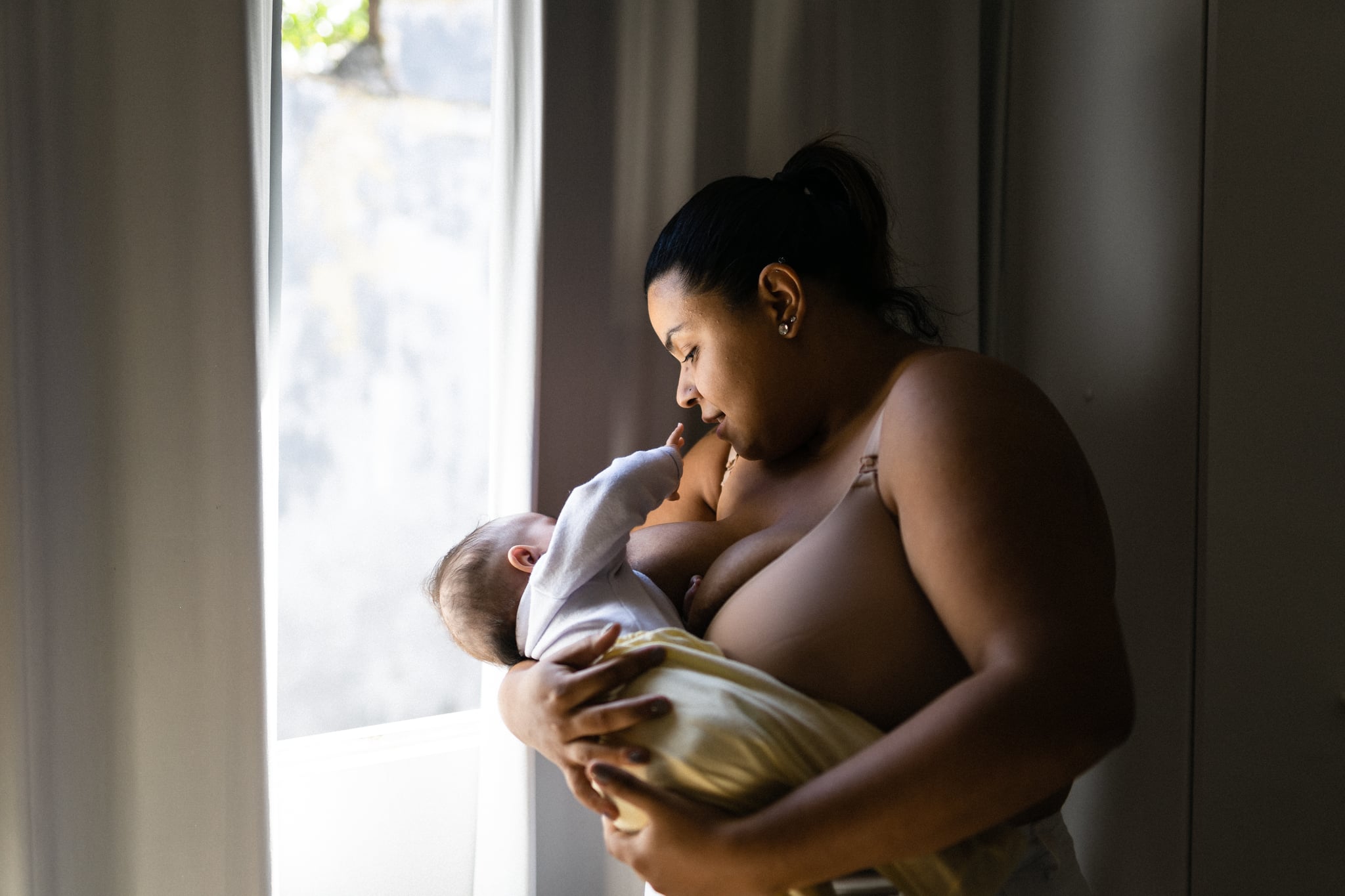 mother breastfeeding baby