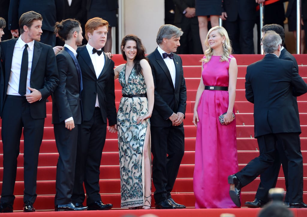 Kristen Stewart wore a sexy dress with a high slit and posed with Kirsten Dunst and the rest of the cast of On the Road for the premiere in Cannes. Kristen Stewart wore a sexy dress with a high slit and posed with Kirsten Dunst and the rest of the cast of On the Road for the premiere in Cannes.