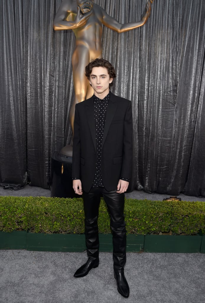 Timothée attended the 2019 Screen Actors Guild Awards in a polka-dot button-up, blazer, and leather trousers by Celine.