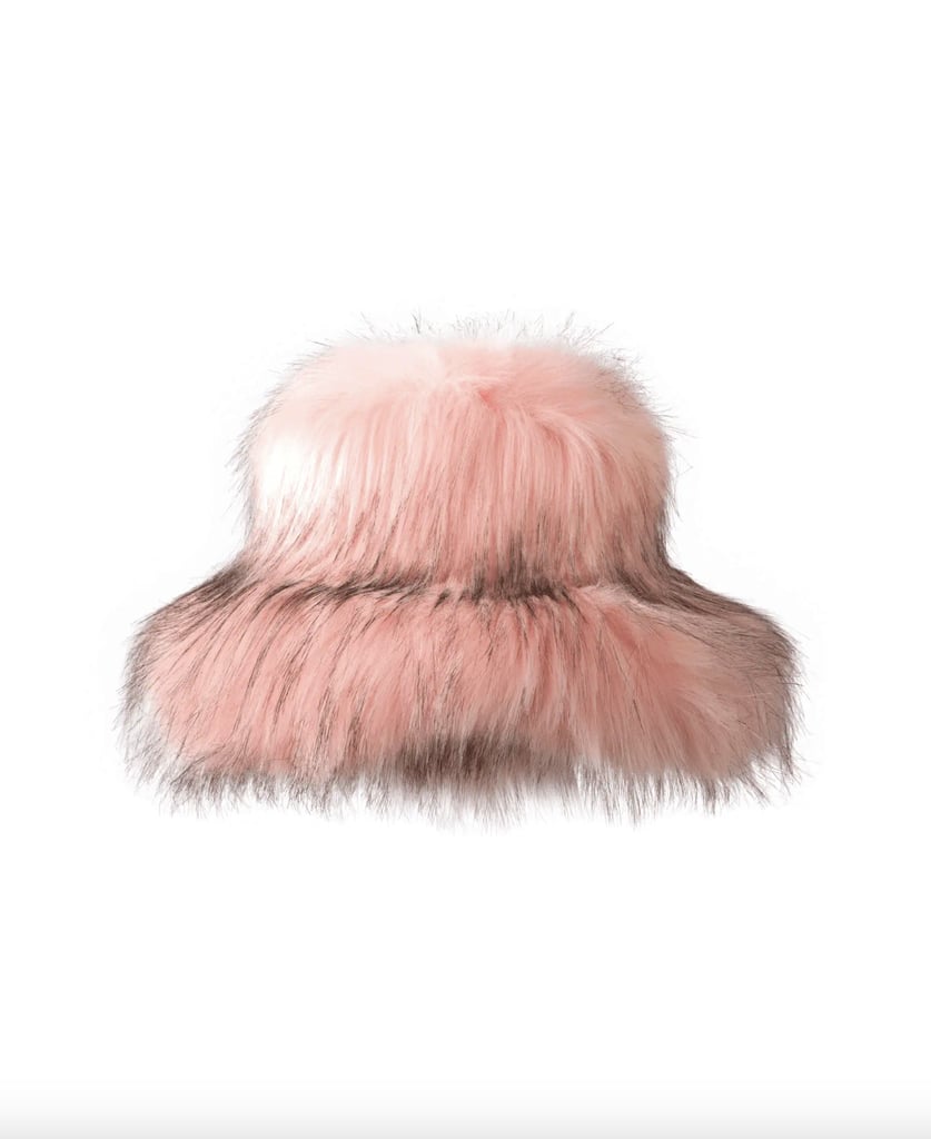 Tyler Lambert Pink Furry Bucket Hat ($160)
I'm not a super impulsive shopper, but when I saw Lori Harvey wear the blue version of this hat, I knew I had to get it. It's so comfortable, and stretchy enough to fit over my thick hair, and it kept me extremely warm on a recent trip to Iceland. I can't wait to pull it out again this winter, and it's perfect for any holiday party with a winter wonderland theme.