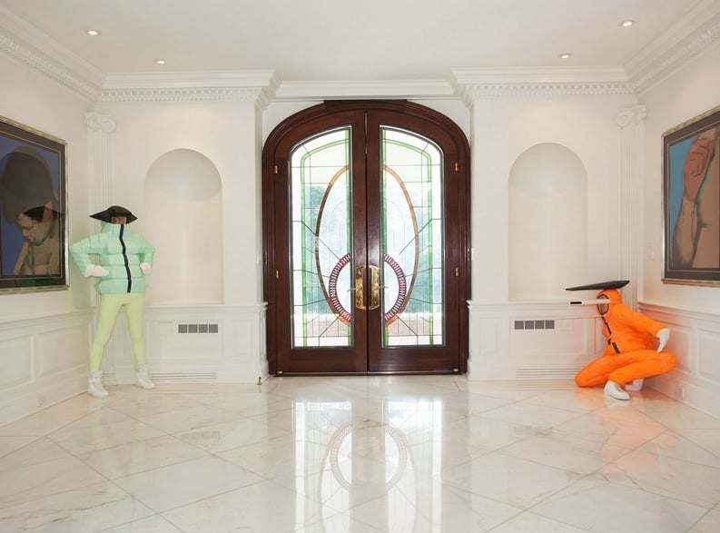 The entrance leads to smooth marble floors.