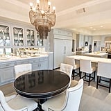 Michelle opted for pieces that combine deco and whimsy, like this bronze chandelier in the kitchen.