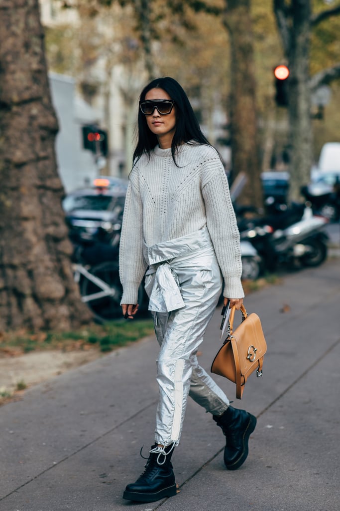 Wear shiny metallic pants with a go-to knit jumper and Dr. Martens platform boots.