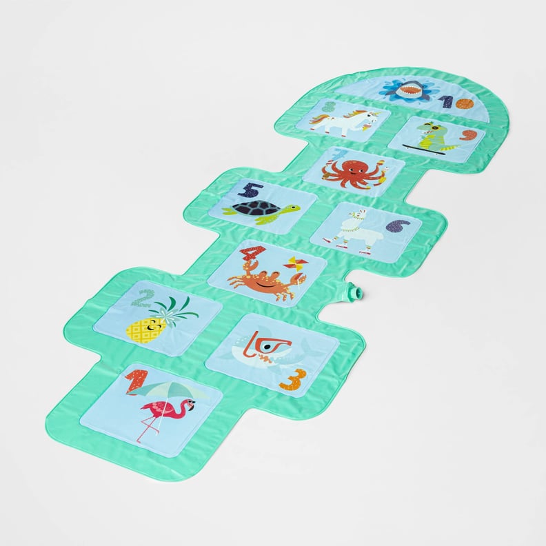 A Playful Sprinkler: Sun Squad Backyard Play Hopscotch Sprinkler