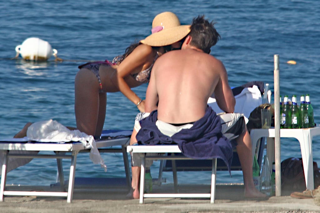 Jenna kissed her husband while vacationing in Italy in July 2010.