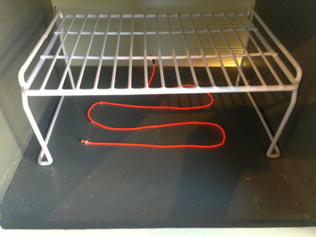 They used a stackable shelf for the oven rack and more electroluminescent wiring.
