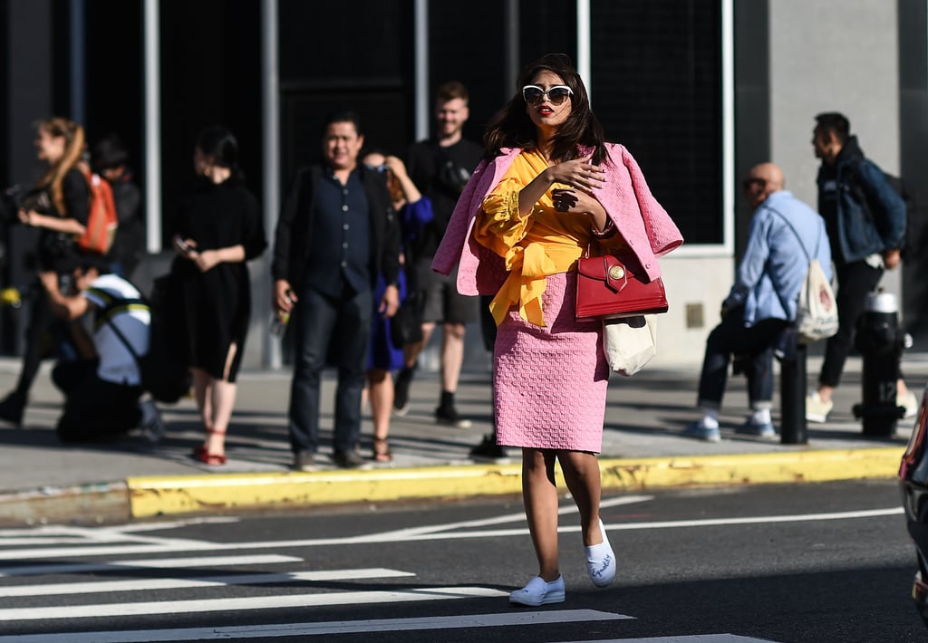 If you own a red purse, consider wearing it with an all-pink outfit. The unexpected pairing will definitely catch everyone's attention.