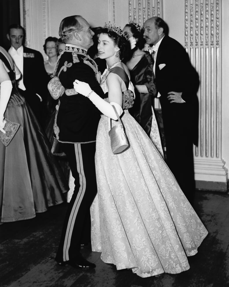 The Queen and Air Marshal Sir John Baldwin at the Hyde Park Hotel in London in November 1954