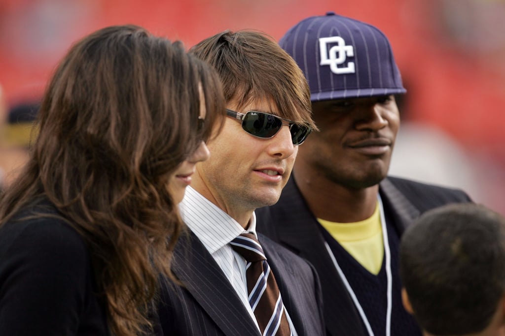 In 2006, Katie joined Tom and Jamie at a Washington Redskins game.