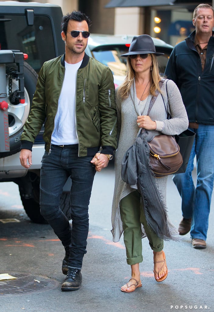 The couple held hands during a day of shopping in NYC in May 2013.