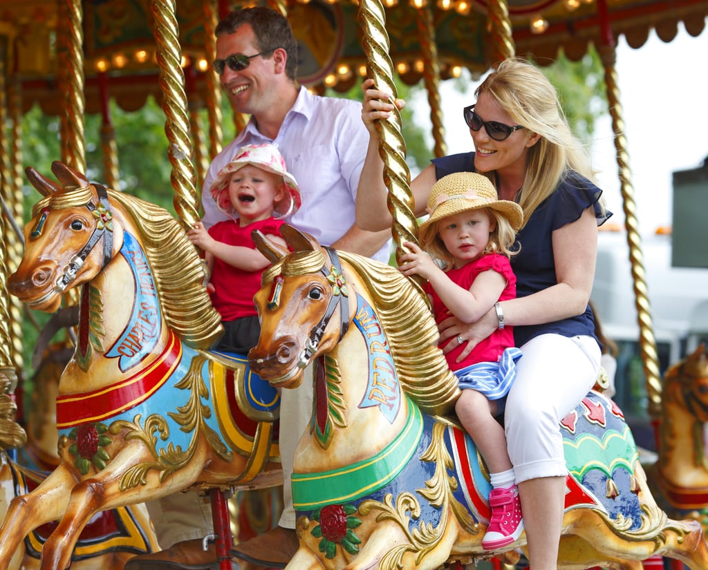In 2014, Autumn looked every bit the "normal" mom as she rode a carousel with Savannah and Isla in Windsor.