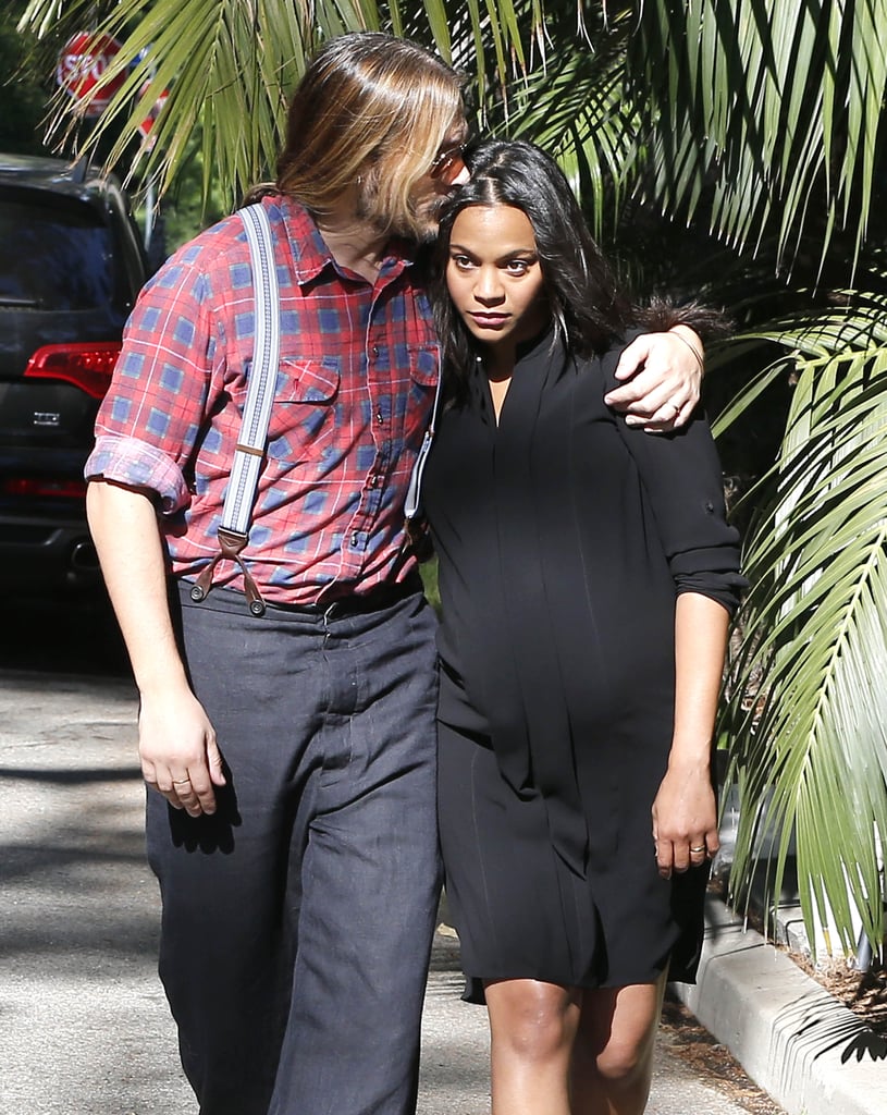 Marco Perego planted a sweet kiss on Zoe Saldana during a Sunday ...