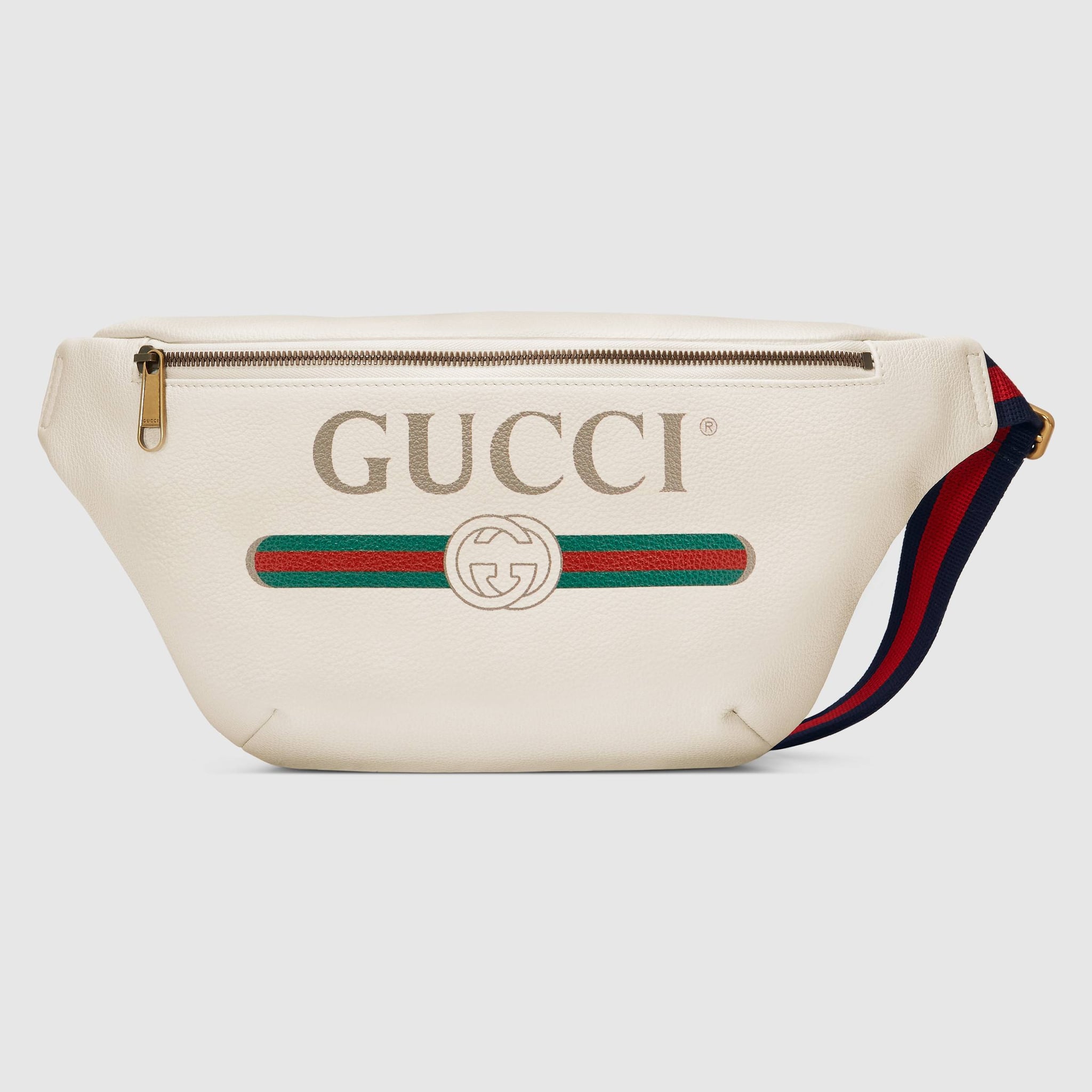 gucci fanny pack with writing on it