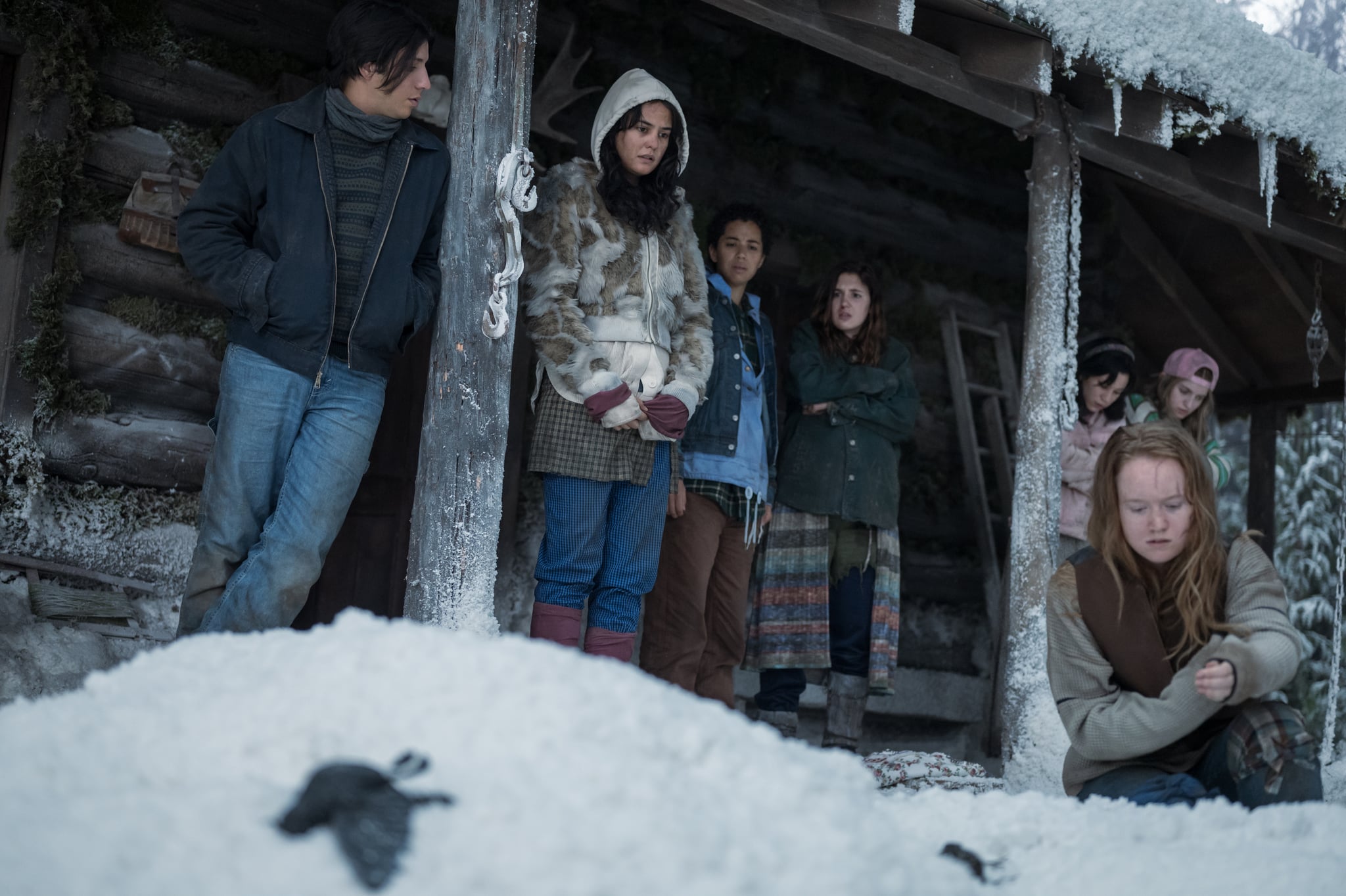 (L-R): Kevin Alves as Teen Travis, Courtney Eaton as Teen Lottie, Jasmin Savoy Brown as Teen Taissa, Sophie Nélisse as Teen Shauna, Mya Lowe as Teen Gen, Liv Hewson as Teen Van and Jenna Burgess as Teen Melissa in YELLOWJACKETS, 