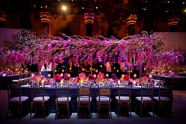 Winding orchid branches create an eye-catching centerpiece.
