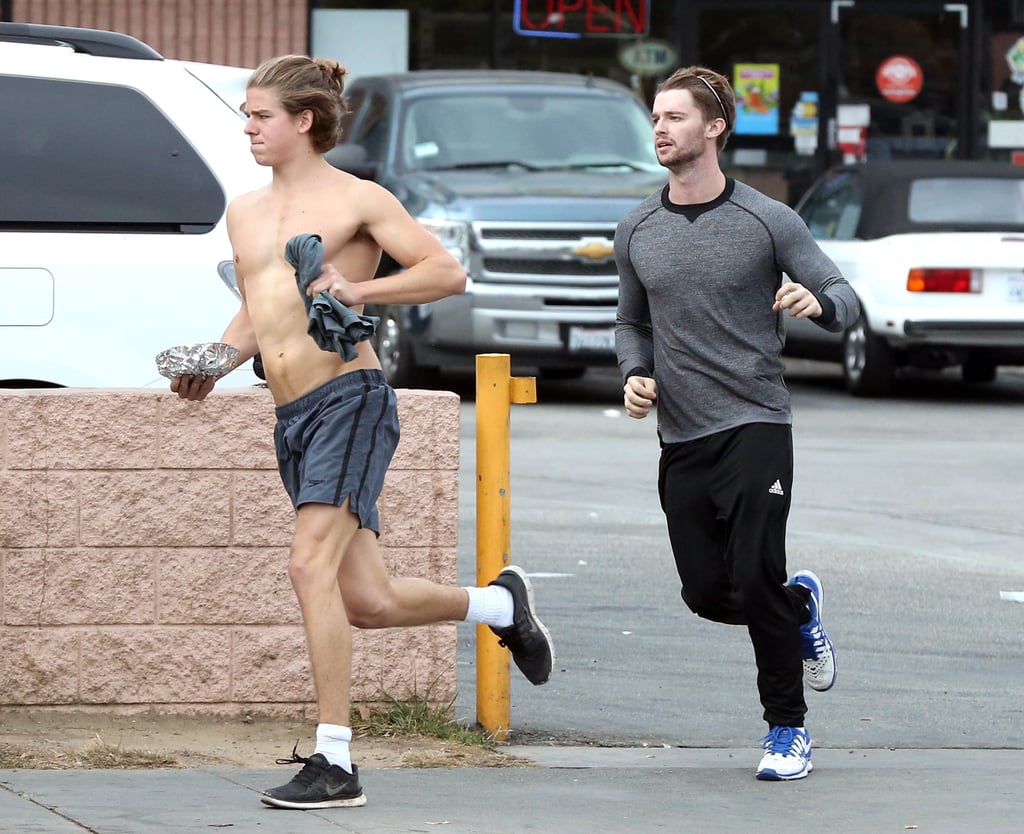 Patrick Schwarzenegger went for a run with a shirtless pal in LA on Tuesday.