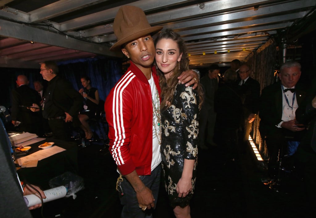 Pharrell took his hat backstage, where they posed with Sara Bareilles.