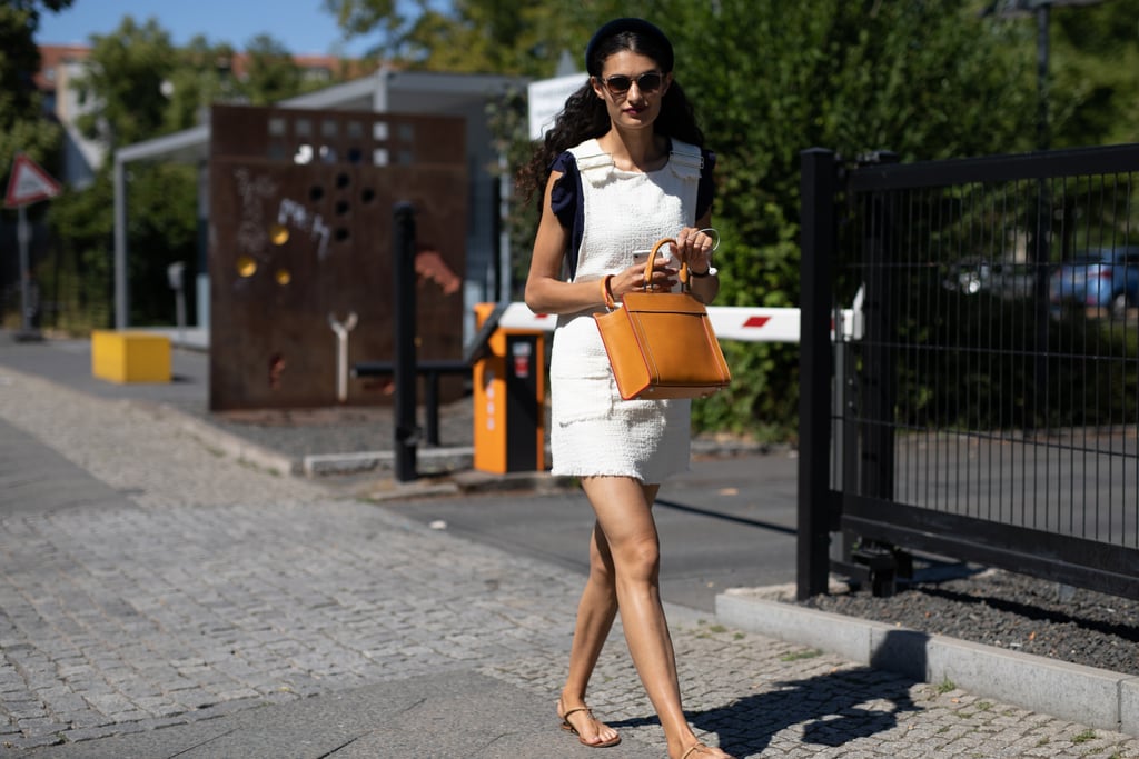 A little jumper and structured bag is a polished way to dress for the heat.