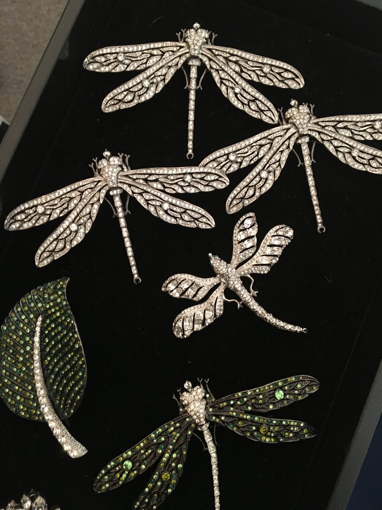 Beautiful details, like these dragonfly pins, accompanied the looks.