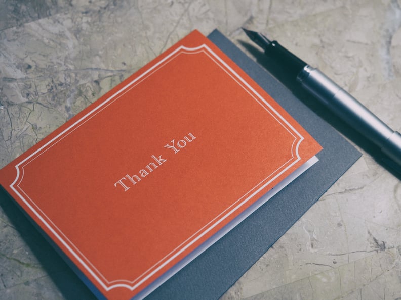 Hand write a thank-you card.