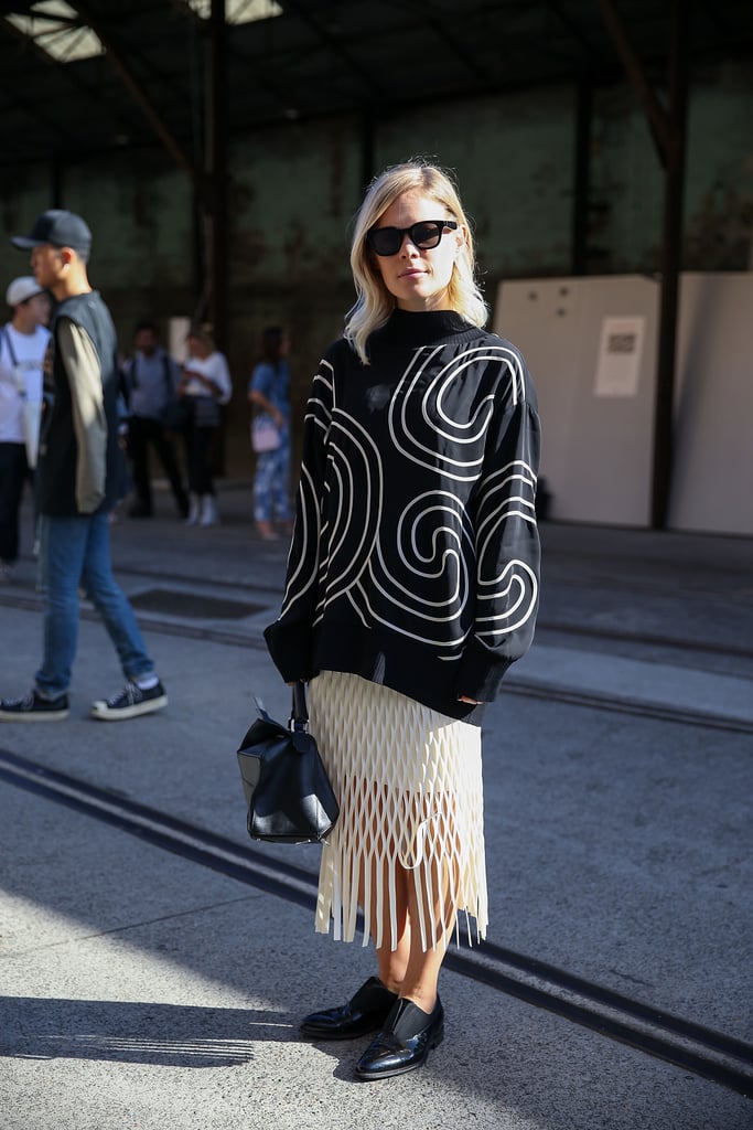 Make Dark Fall Separates Perfect For the Spring Season by Throwing On a Breezy Skirt