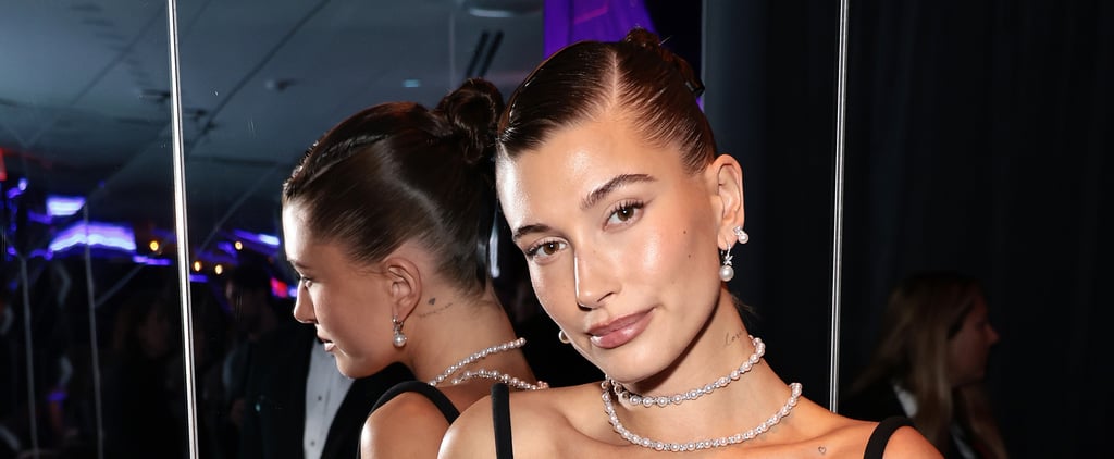 Hailey Bieber's Pamela Anderson Messy Bun Updo: See Photos