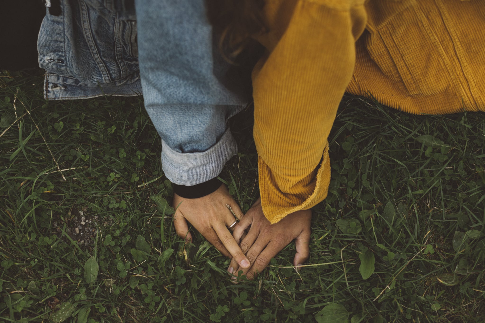 Couple holding hands.