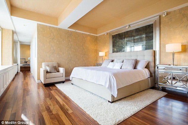 The master bedroom includes an enormous walk-in customized closet.