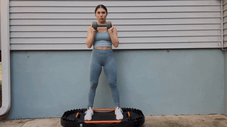 Weighted Squat and Twist on a Flat-Top Bosu Ball / Terra-Core