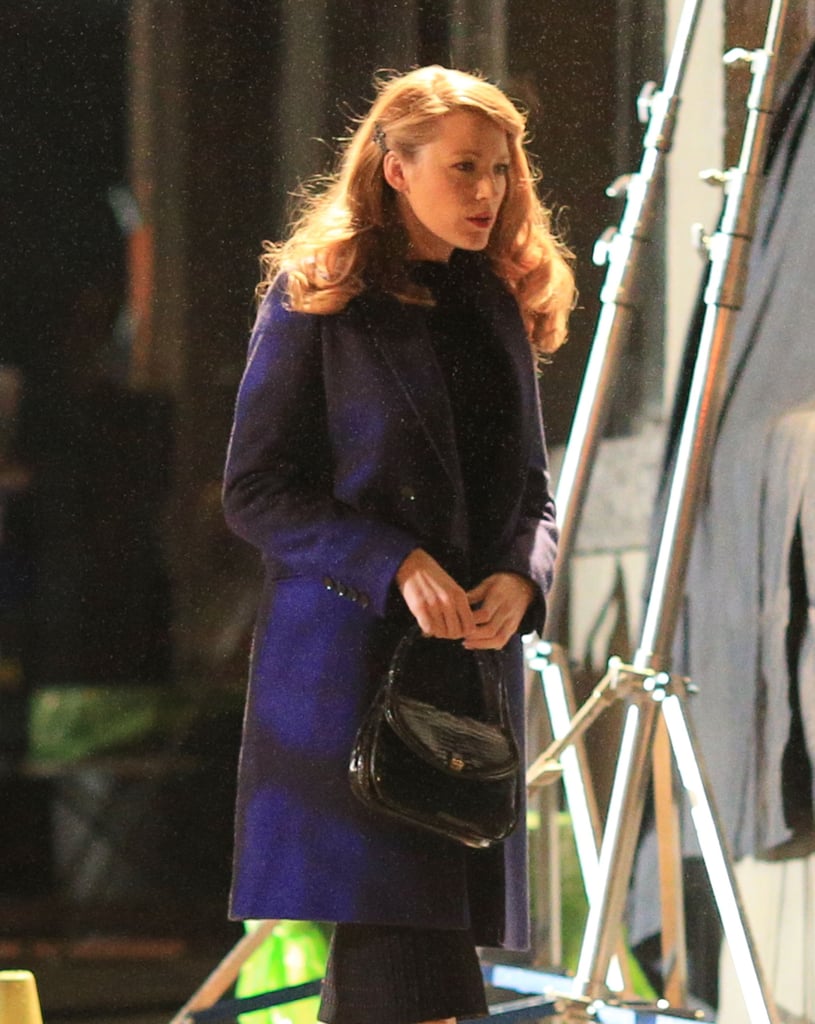 Blake Lively was covered up while filming scenes for her new movie, The Age of Adaline, in Vancouver, British Columbia, Canada, on Friday.