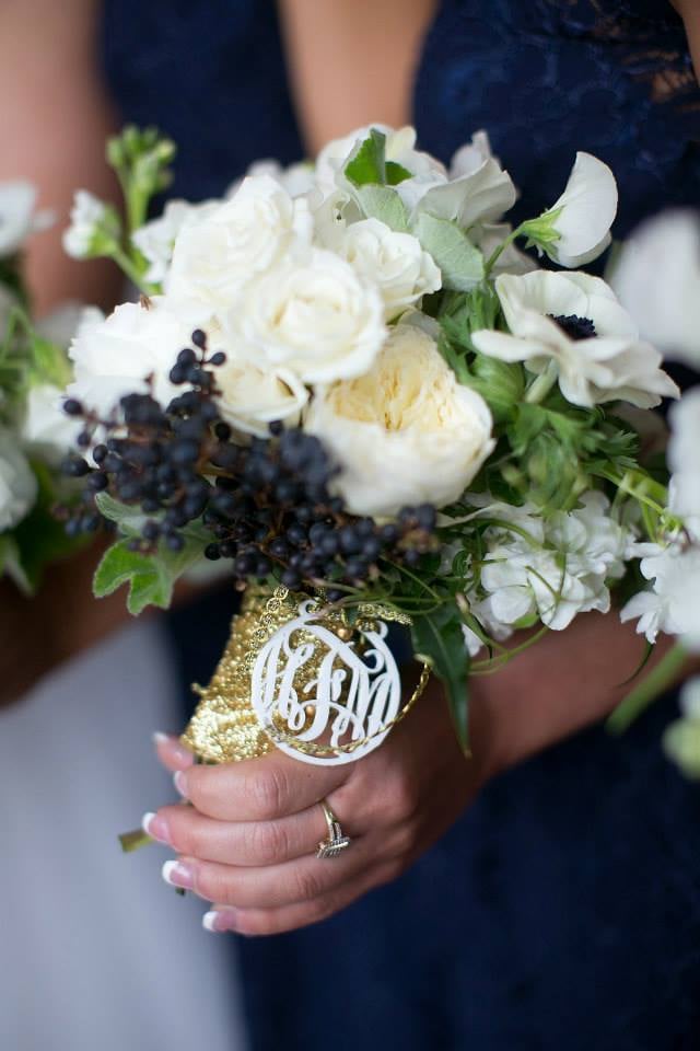 Have bridesmaids carry embellished bouquet wraps.